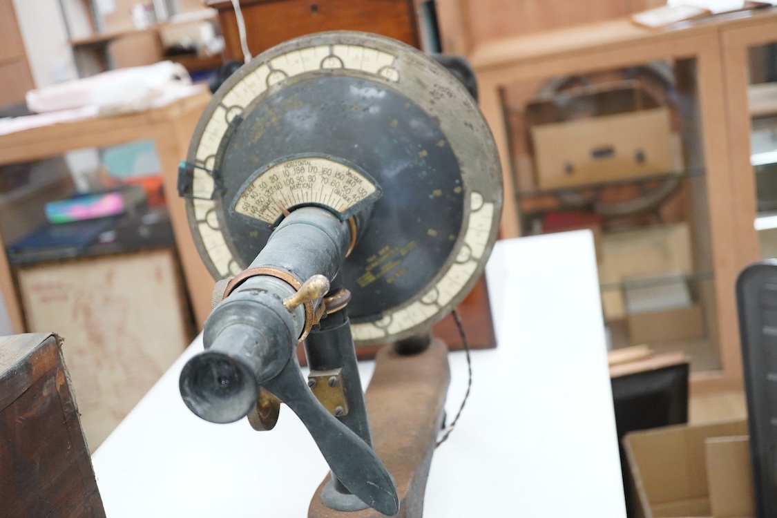 An early 20th century ophthalmic keratometer, designed to allow opticians to establish the curvature of a patient’s eye, constructed of cast-iron, brass and tin, and fitted with electric lamps and early celluloid scales,